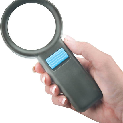 3x 10 LED Illuminated Pocket Magnifier held in hand, designed for detailed inspection and reading.