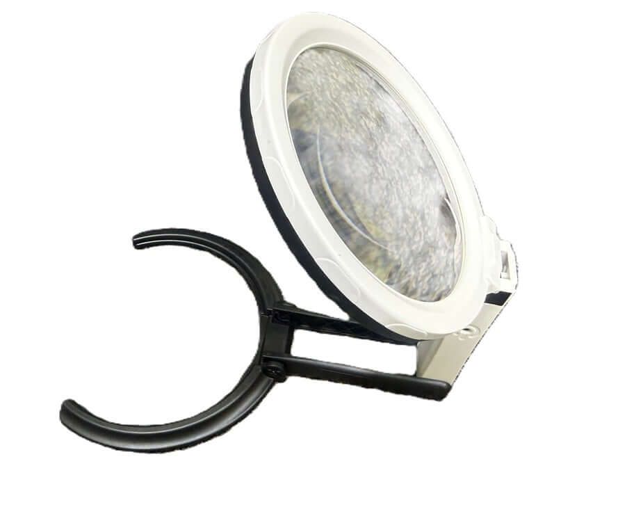 Hands-Free Folding Stand Magnifier 12 LED with 5-inch lens and bifocal inset for well-lit viewing.