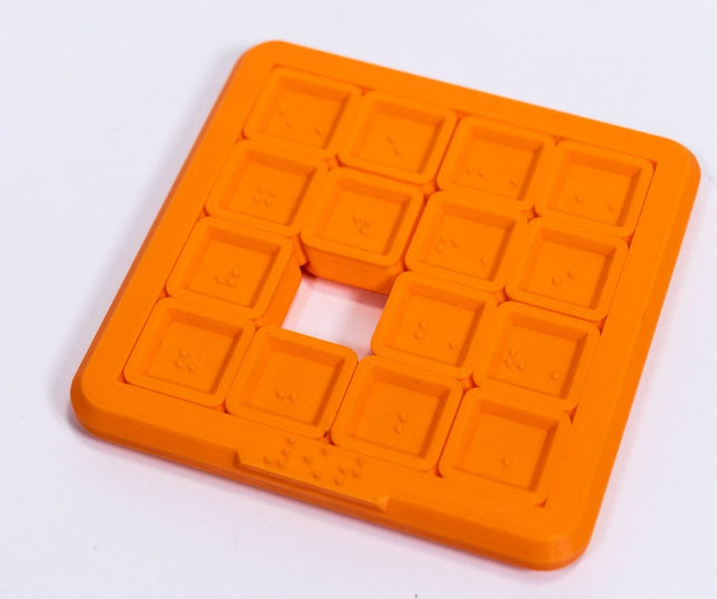 3D Braille sliding puzzle game in orange, featuring raised Braille dots for tactile play, 4x4 inch design.