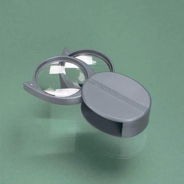 Dual lens magnifier with 4X and 5X lenses in a protective swing-away case.