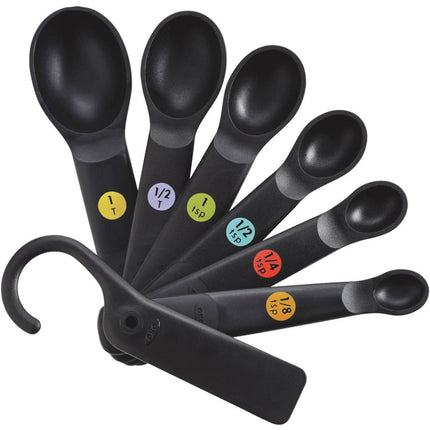 Good Grips non-slip measuring spoon set in black, featuring bright, color-coded permanent measurements for easy use.