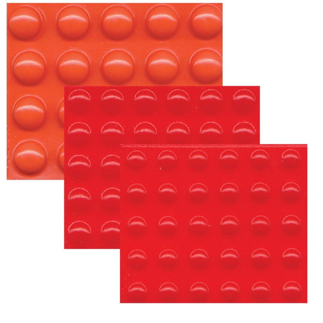 Tactile bump dots for low vision in orange and red, featuring small, medium, and large round self-adhesive dots.