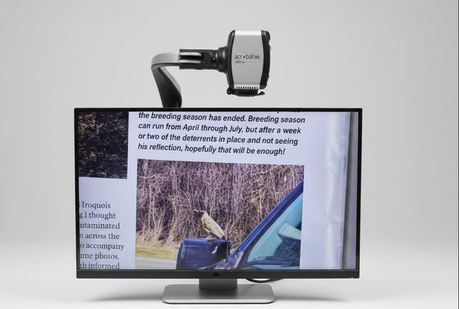 Image of the Demo Unit Enhanced Vision Acrobat HD Ultra desktop video magnifier displaying text and an image.