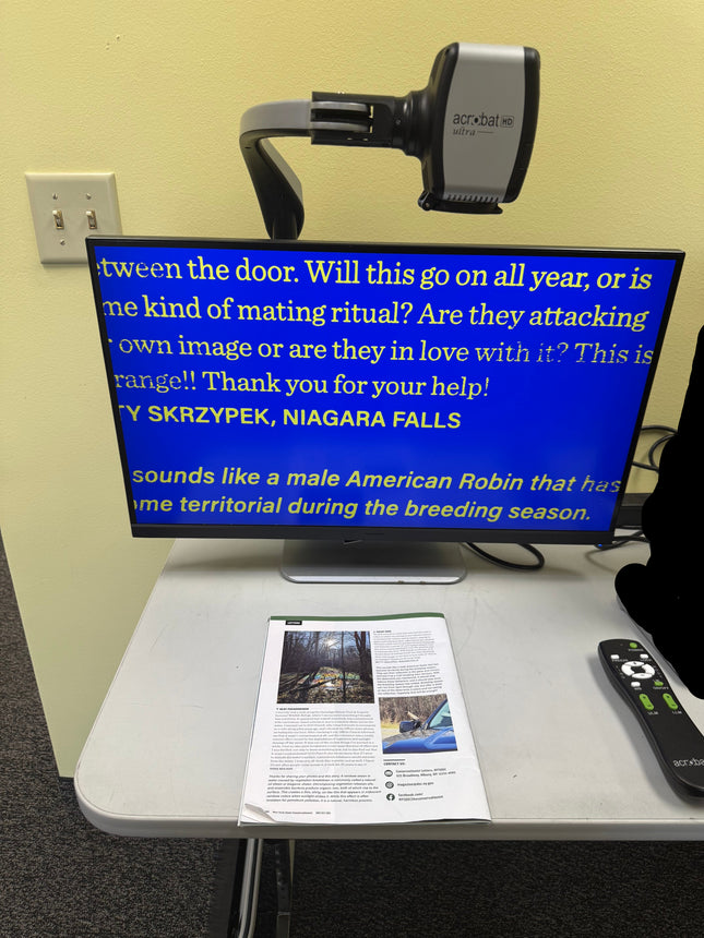 Demo Unit Enhanced Vision Acrobat HD Ultra displaying text on screen for low vision assistance.