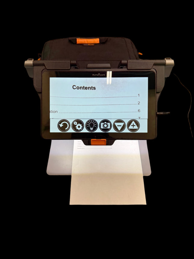 Used HumanWare Connect 12 video magnifier displaying text on paper with touchscreen interface.