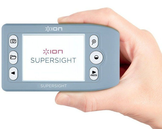 Handheld video magnifier from ION Supersight held in a hand, featuring a clear display and controls.