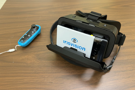 VR headset with Irisvision logo on a wooden surface