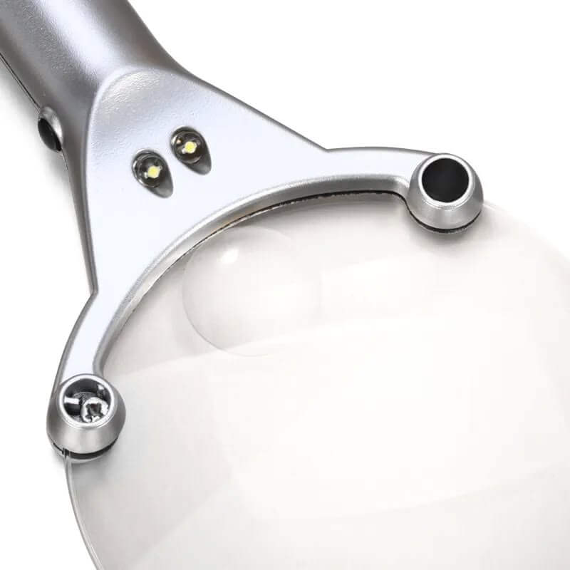 Frameless Handheld Magnifier 2X Dual-Light LED Illuminated Magnifying Glass close-up with dual LED lights.