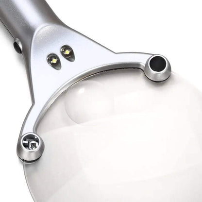 Frameless Handheld Magnifier 2X Dual-Light LED Illuminated Magnifying Glass close-up with dual LED lights.