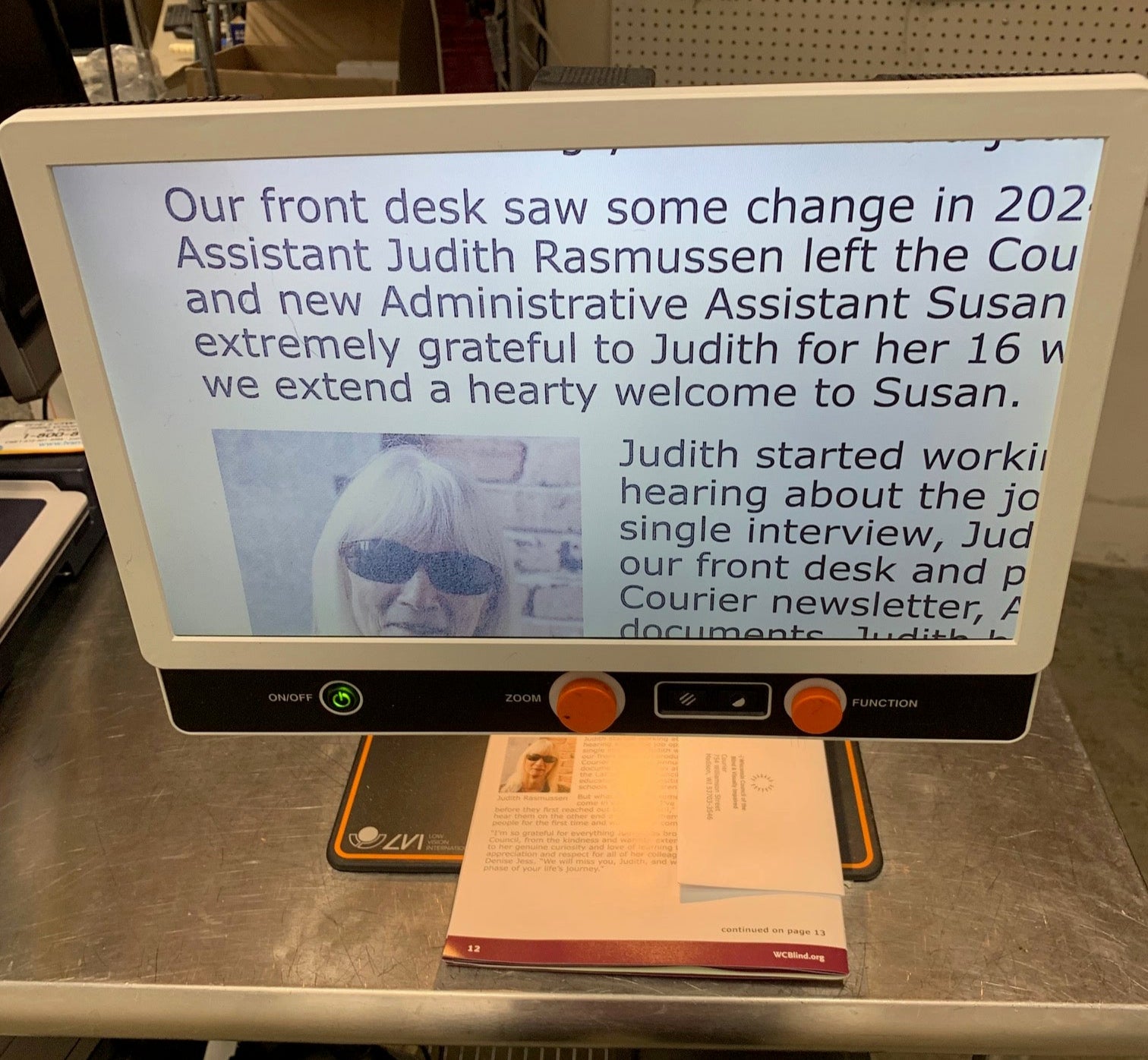 Digital display with text on a counter in a kitchen setting