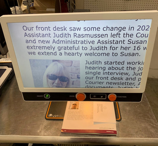 Digital display with text on a counter in a kitchen setting