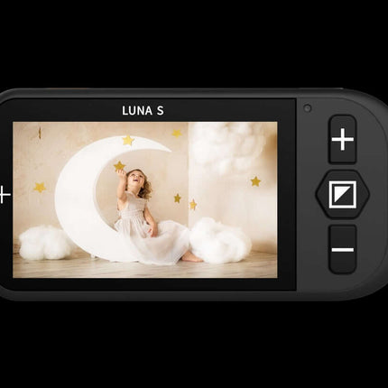 Luna S handheld video magnifier displaying a girl with a crescent moon backdrop.