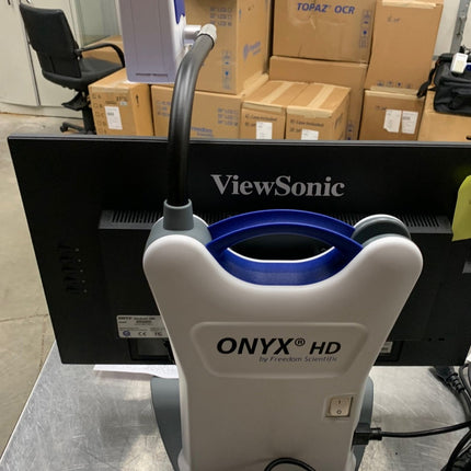 Used ONYX 22 inch video magnifier connected to ViewSonic monitor with flexible camera setup.