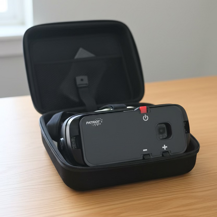 Black VR headset in an open case on a textured surface