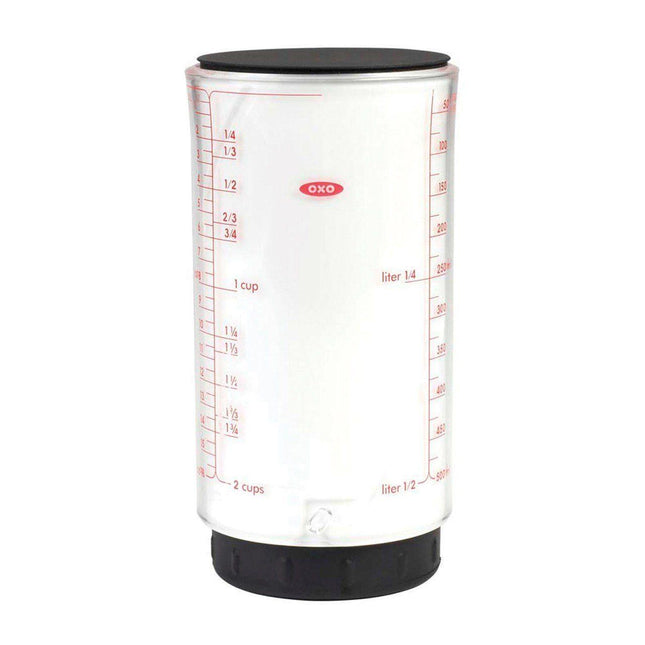 Adjustable Measuring Cup-Low Vision for easy measurement of wet or dry ingredients, featuring clear markings and silicone squeegee.