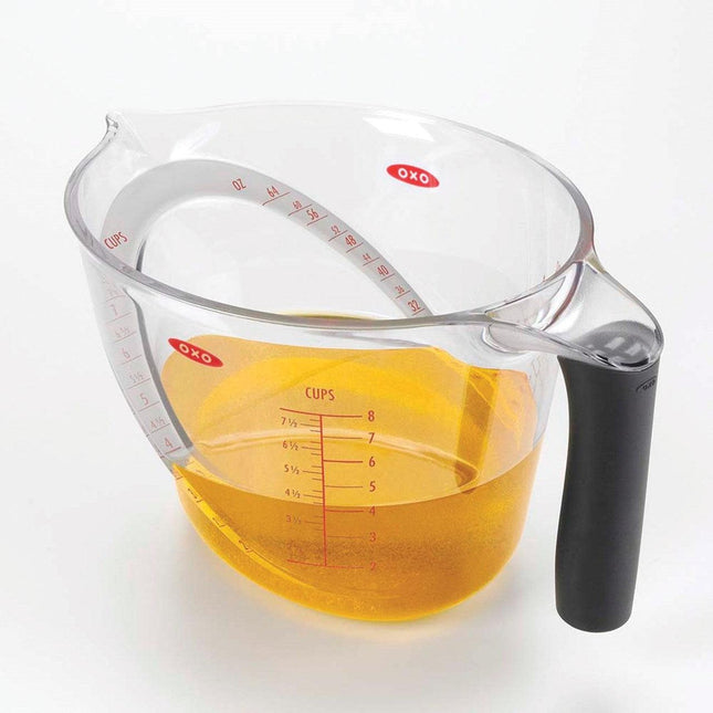 Angled Measuring Cup Set by OXO, featuring a clear design with measurement markings and a non-slip handle.