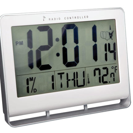 radio-controlled LCD number clock displaying time, date, and temperature on a clear LCD screen.