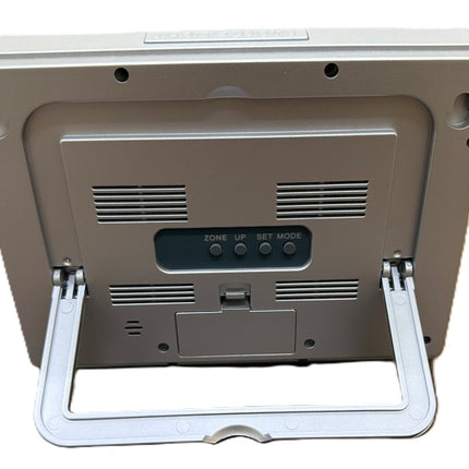 Back view of the Atomic 2-inch LCD number clock showing buttons and stand for easy placement.