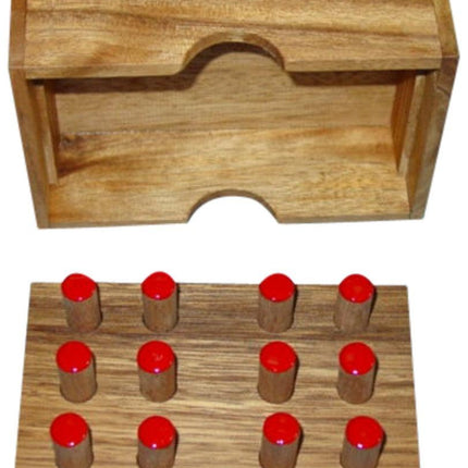 Braille learning toy with wooden board and red pegs, designed for creating Braille characters.