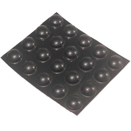 Large black bump dots displayed on a sheet, self-adhesive, perfect for various surfaces.