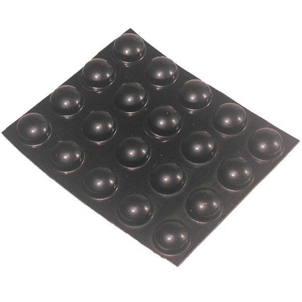 Large black bump dots displayed on a sheet, self-adhesive, perfect for various surfaces.