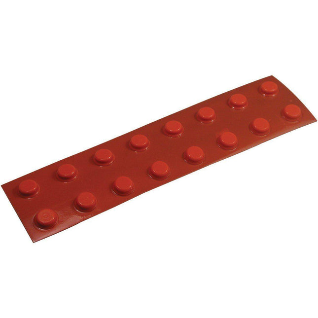 small flat top orange bump dots on a peel-and-stick adhesive strip, great for marking surfaces.