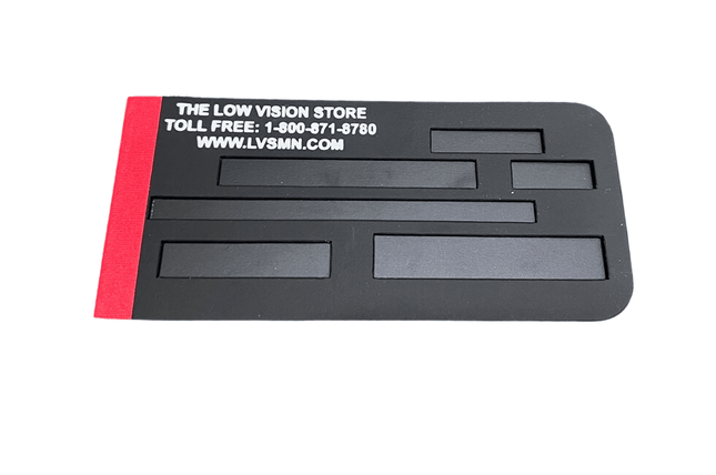 Check writing guide for the blind, black check guide with red edge, designed to fit standard checkbooks.