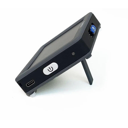 Clover 3 handheld video magnifier with 3.5-inch screen and foldable stand, ideal portable video magnifier for reading.