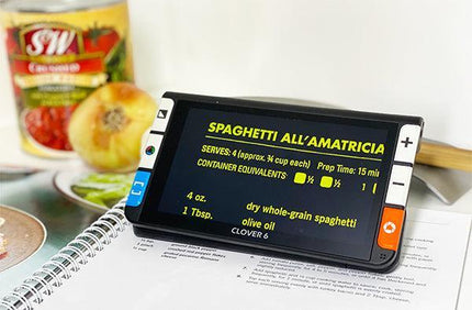 Clover 6 HD handheld video magnifier displaying a recipe for Spaghetti All'Amatriciana in bright text.