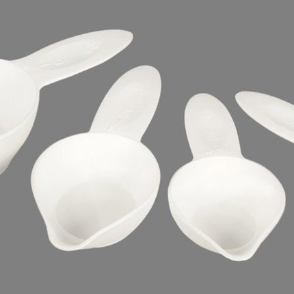 Set of 4 Nested Braille Measuring Cups showing durable plastic design for easy use and storage, perfect for braille measuring cups set.