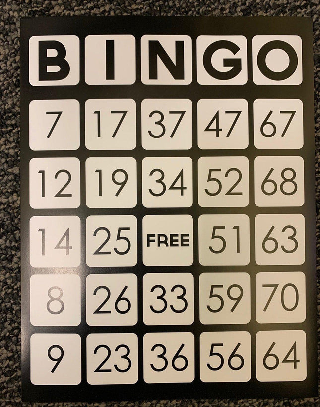 Large print bingo cards showing a traditional bingo layout with numbers and a free space.