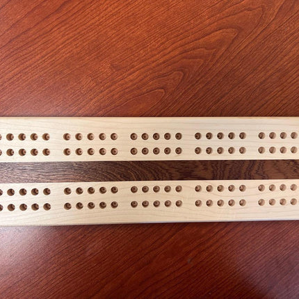 Hand crafted jumbo size cribbage board featuring two player tracks and multiple peg holes.