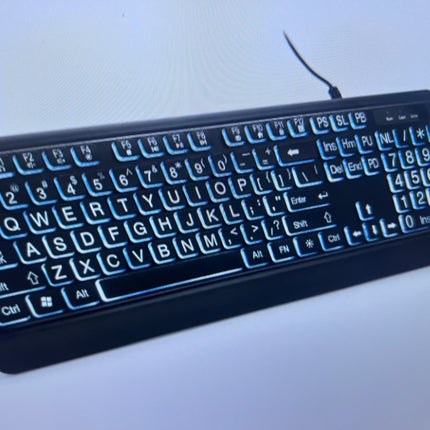 Large text LED backlit keyboard with ergonomic design and USB connection, featuring oversized letters and numbers.