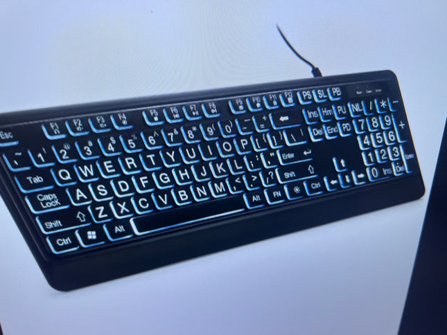 Large text LED backlit keyboard with ergonomic design and USB connection, featuring oversized letters and numbers.