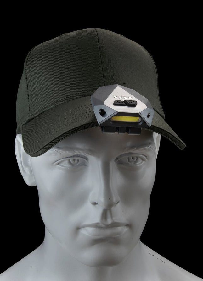 Nebo Einstein Cap Light worn on a cap, showcasing the design of a rechargeable cap light for outdoor enthusiasts.
