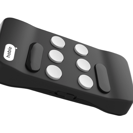 Hable One Braille Keyboard showcasing its eight-key design for smartphone control.
