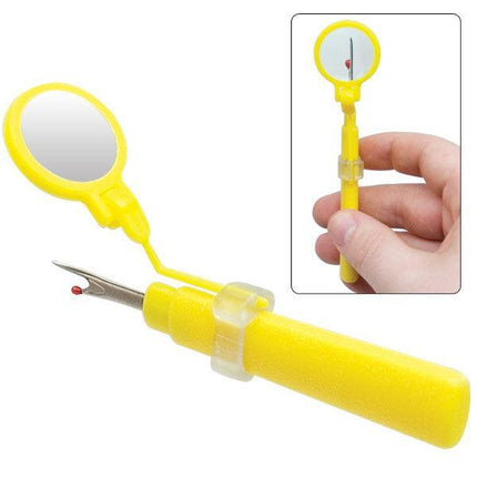 Seam ripper with magnifier for low vision, featuring an adjustable 5x magnifying lens and ergonomic design.