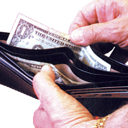 Soft leather wallet with card slots displaying cash and credit cards, ideal for organization and style.