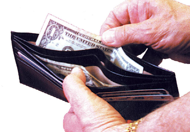 Soft leather wallet with card slots displaying cash and credit cards, ideal for organization and style.