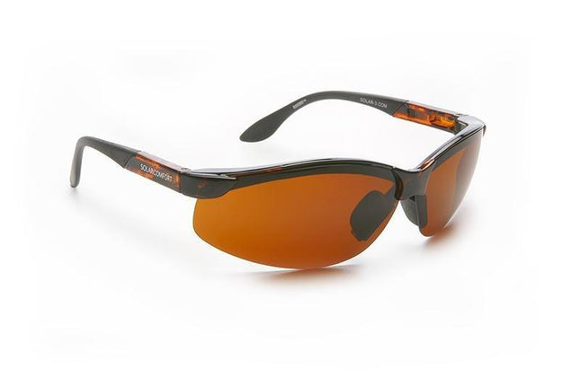 Polarized amber sunglasses by Solar Comfort with lightweight wrap-around design for improved contrast and glare reduction.
