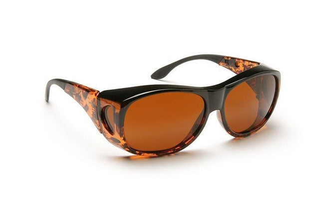 Amber solar shield glasses with tortoiseshell frames for low vision patients, providing contrast-enhancing protection.