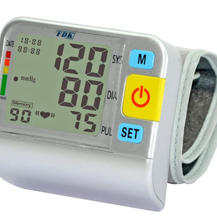 Talking wrist cuff blood pressure monitor with large display and easy-to-use buttons.