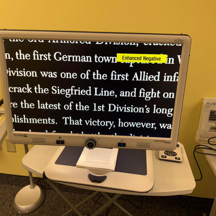Used Merlin HD Elite Video Magnifier displaying enlarged text with Enhanced Negative mode for users with visual impairments.