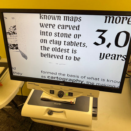 Used Merlin 24" Video Magnifier displaying text for easy reading with low vision.
