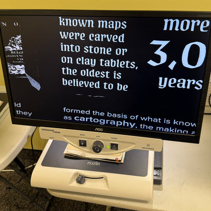 Used Merlin 24" Video Magnifier in action displaying text for low vision users.