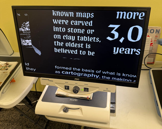 Used Merlin 24" Video Magnifier in action displaying text for low vision users.