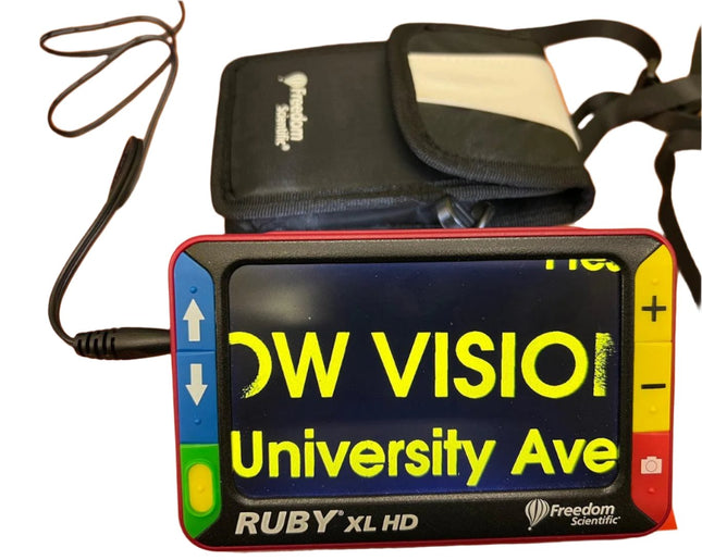 Used Ruby XL HD video magnifier displaying text with built-in LED lighting and portable carrying case